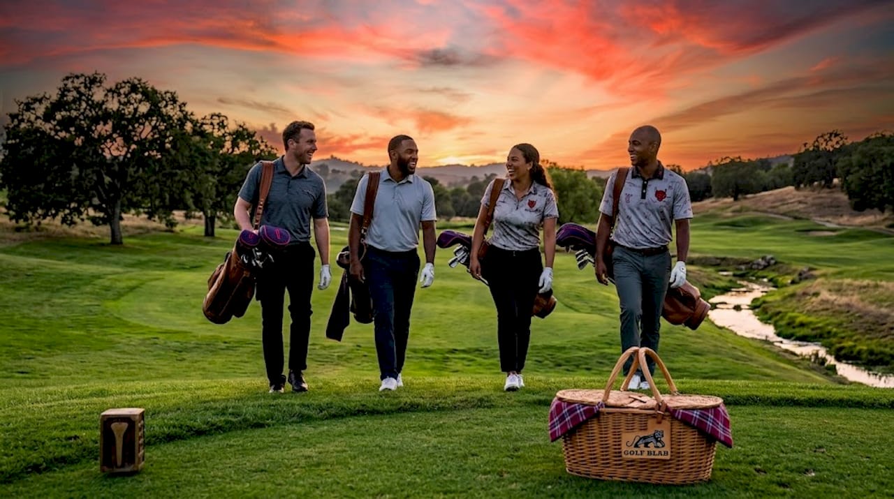 Friends chatting while walking on golf course